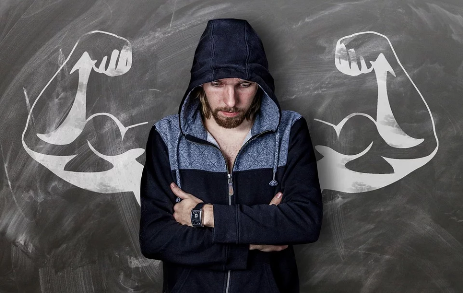 a person and picture of muscular arms